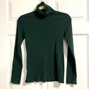 green ribbed turtleneck shirt